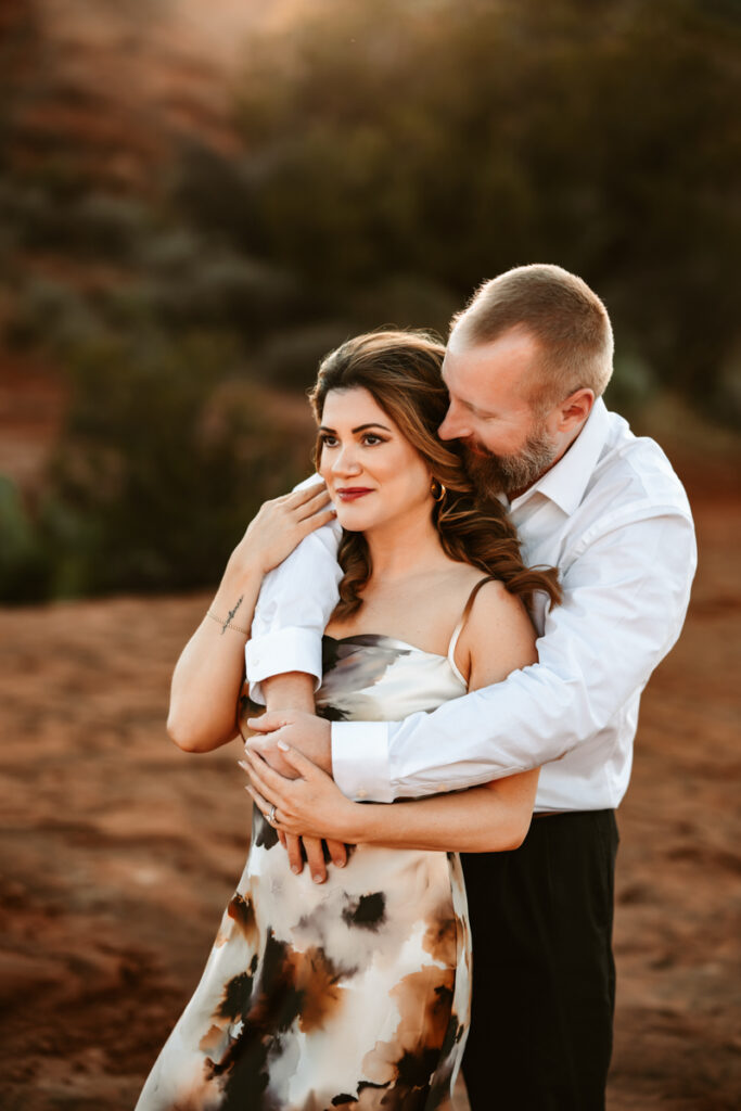 Couple hugging in sedona.