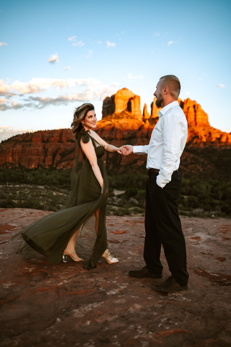 Couple dancing at secret slick rock in sedona.
