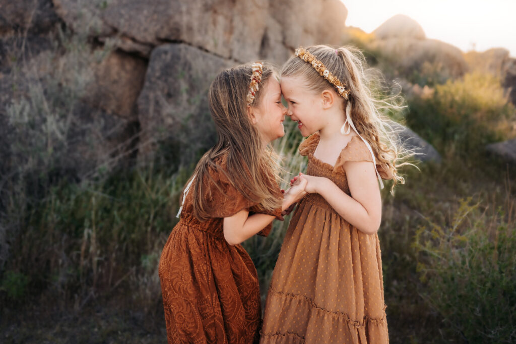 Flagstaff family session in a field.