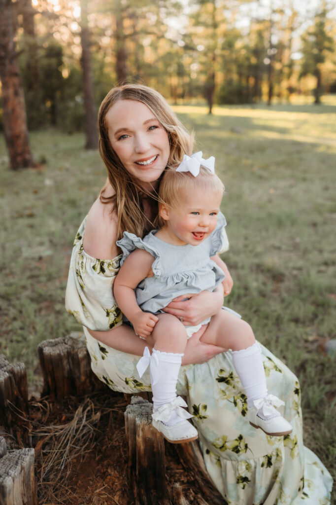 Mommy & me mini session photo dressed in a floral maxi dress in Flagstaff.