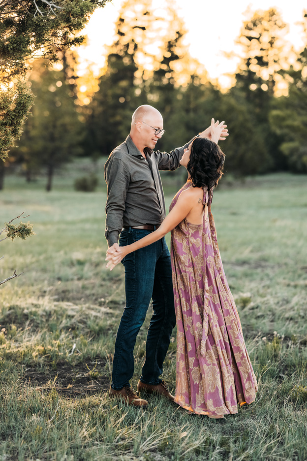 Flagstaff, Arizona couple's photography session dancing in a field at Marshall Lake.