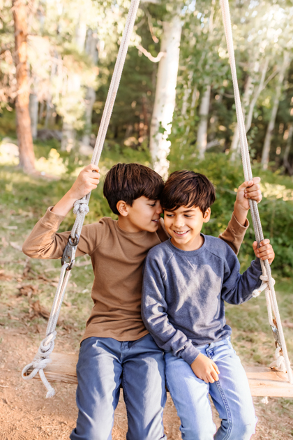 Boys swinging at Arizona Snowbowl in Flagstaff by Annie Bee Photography.