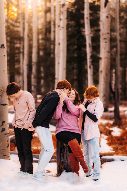 Flagstaff, Arizona teenagers playing in the snow at Arizona Snowbowl by Annie Bee Photography.