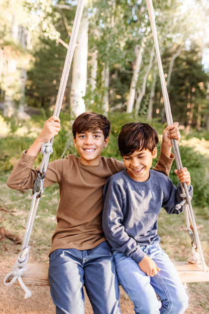 Brothers at Aspen Corner in Flagstaff swinging by Annie Bee photography.