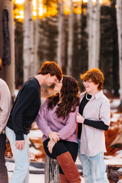 Family playing in the snow at Arizona Snowbowl in Flagstaff by Annie Bee Photography.