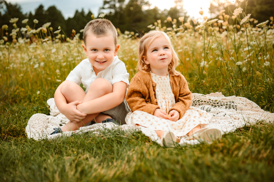 Flagstaff, Arizona extended family photography session at Forest Highlands of brother and sister fall portrait session.