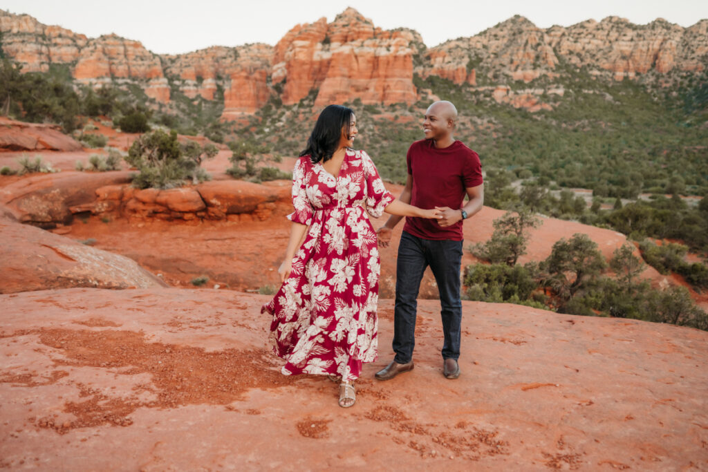 Couple dancing in the red rocks of Sedona at Bell Rock by Annie Bee Photography.