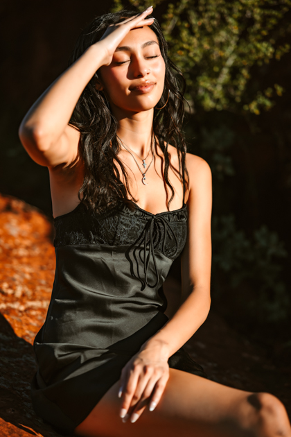 NAU senior graduate in full sun in Flagstaff, Arizona by Annie Bee photography.