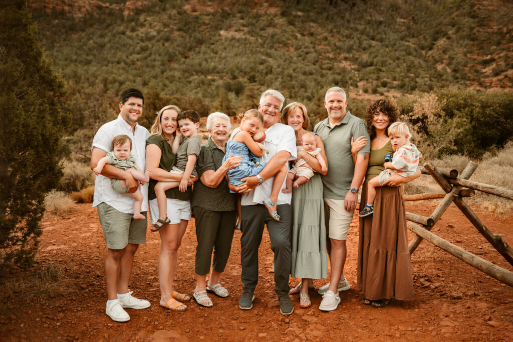 Extended family enjoying a photo session with Annie Bee Photography in the stunning red rocks of Sedona.