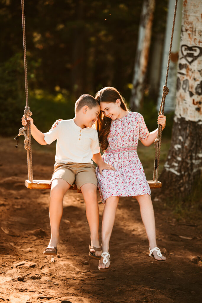Kids at Aspen Corner on the swing.