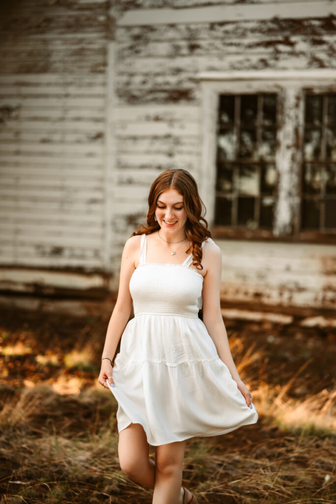 Senior session at an abandoned cabin in the wood in flagstaff by annie bee photography.