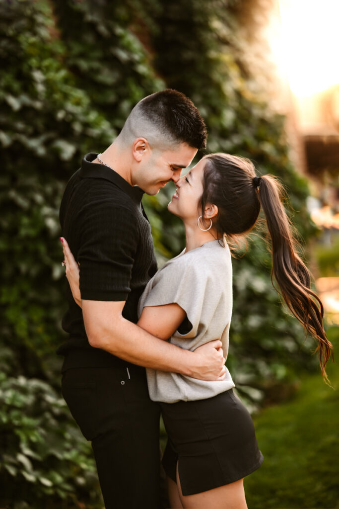 Proposal in downtown flagstaff with couple in front of the city of flagstaff vines by annie bee photography.