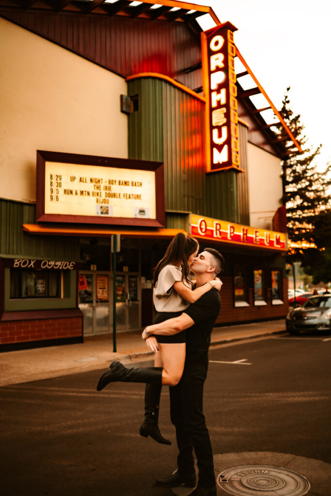 Orpheum theater in downtown flagstaff with couple kissing by annie bee photography.