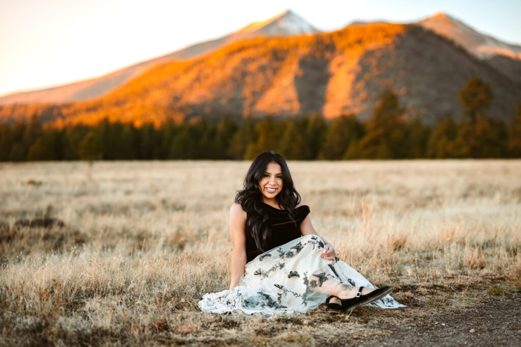 Woman in front of Mount Humpreys in flagstaff wearing a dress by annie bee photography.
